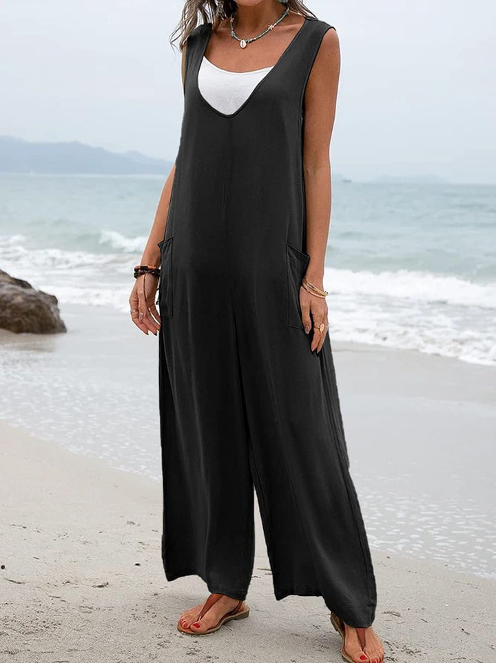 Relaxed overall with deep V-neck and two side pockets