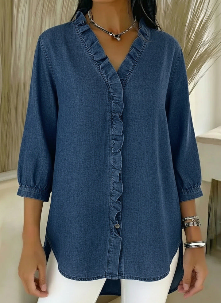 Elvari – Elegant blouse with ruffle details