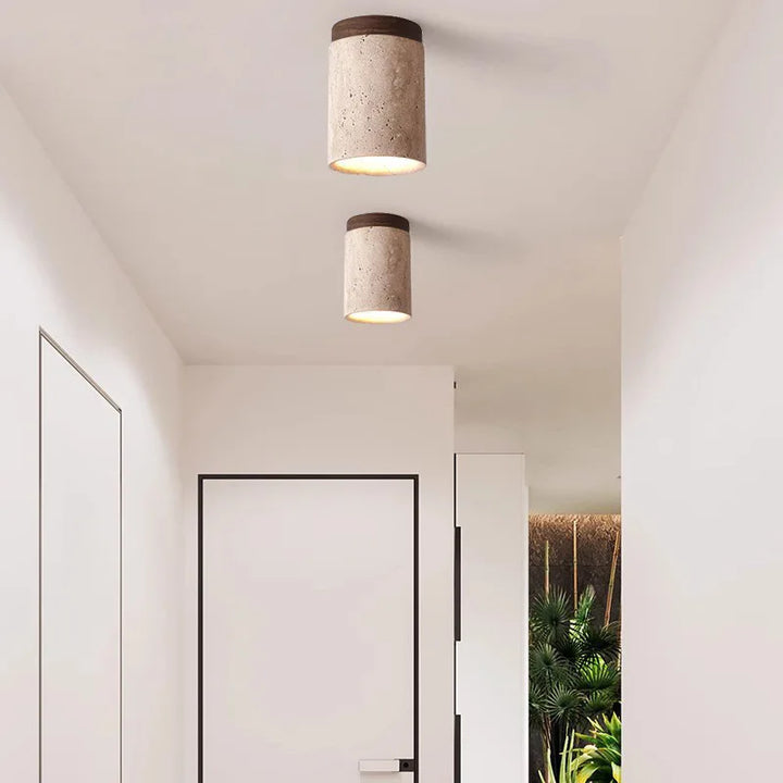 BowLift | Built-in lustre made of travertine for entrance area and staircase