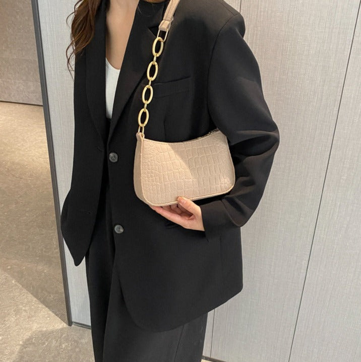 Magnella | Elegant shoulder bag in crocodile-embossed design