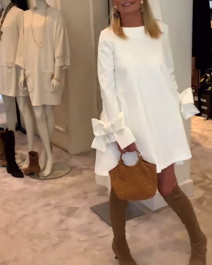 NIA – ELEGANT BOW-SLEEVE MINI DRESS