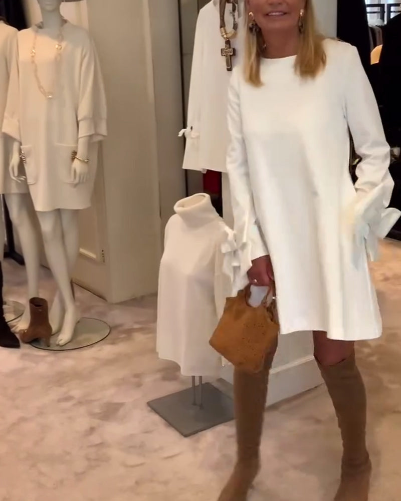 NIA – ELEGANT BOW-SLEEVE MINI DRESS