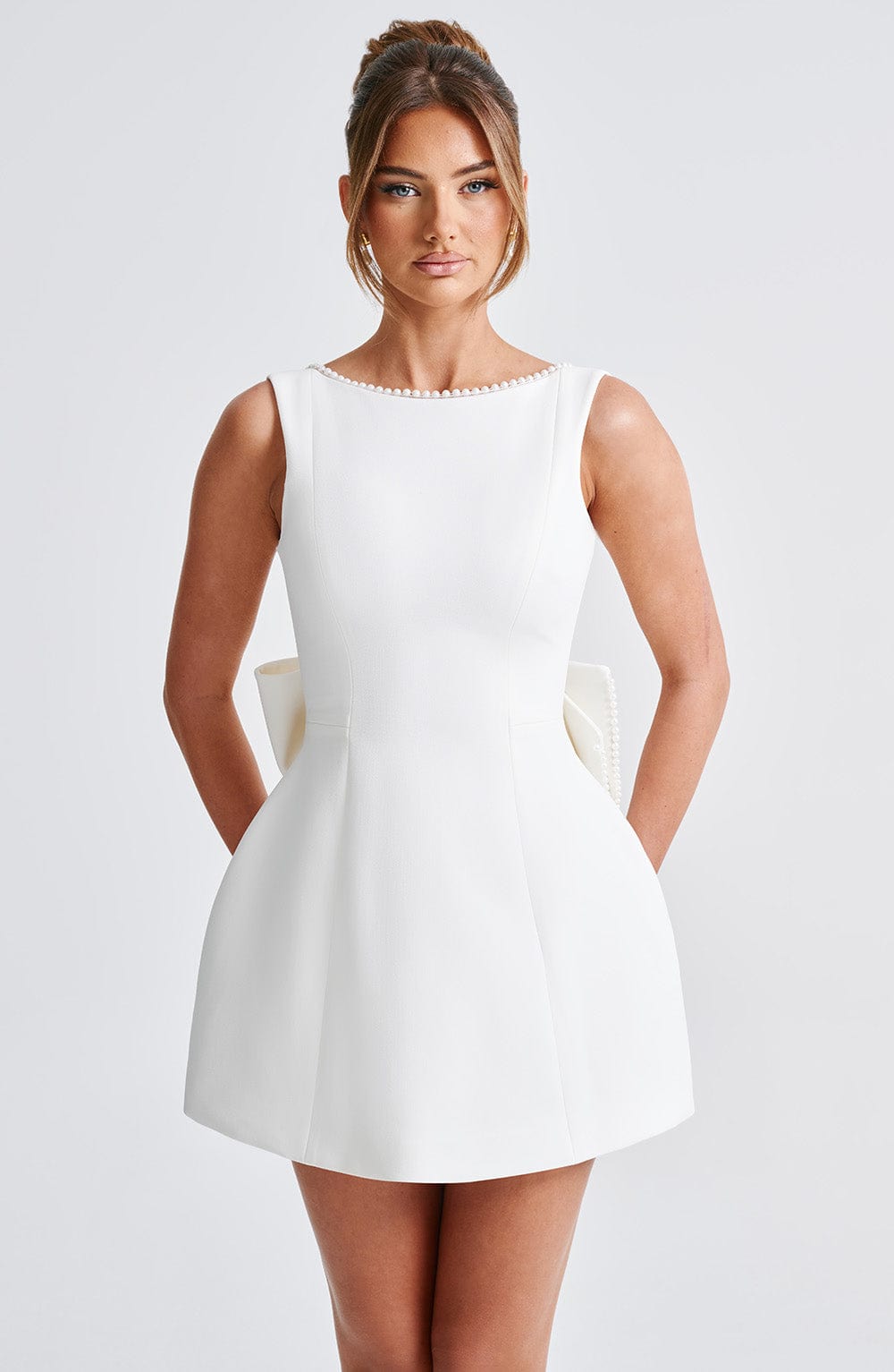 Hollis - Elegant Pearl Bow Mini Dress