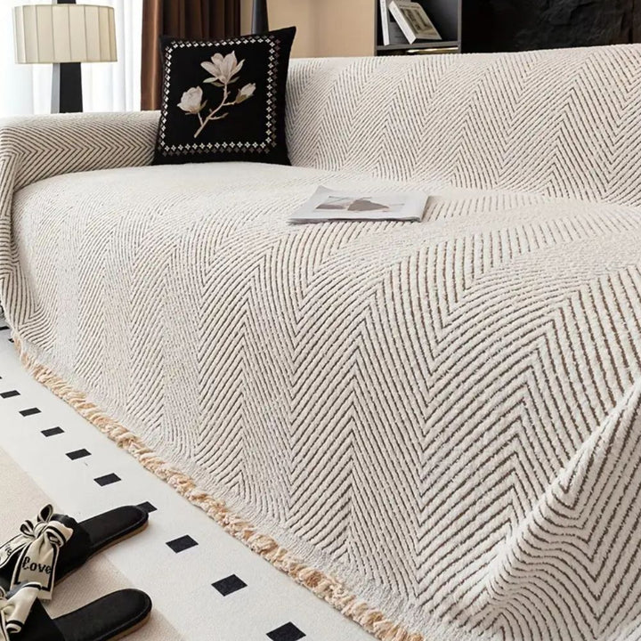BowLift | CUSHVIVE – Herringbone Sofa Cover with Splash Protection and Non-Slip Design