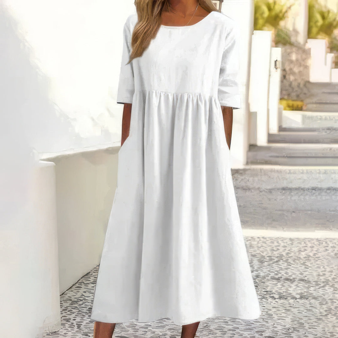 Maikee - Cotton dress with round neckline and pockets